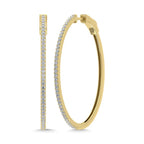 Gold hoop earrings with embedded diamonds on a white background