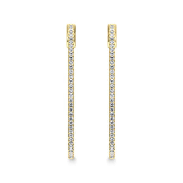 Gold hoop earrings with embedded diamonds on a white background