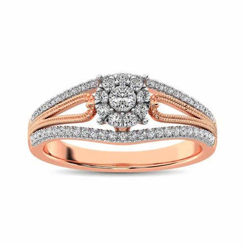 Rose gold and silver ring with diamonds on a white background