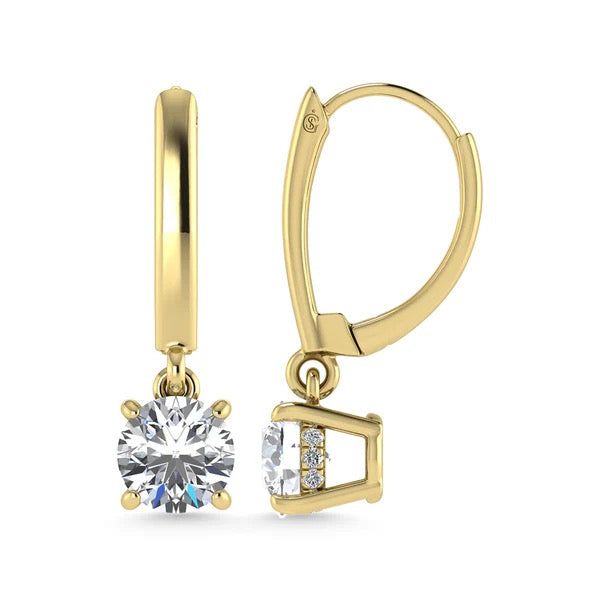 Gold hoop earrings with clear gemstones on a white background
