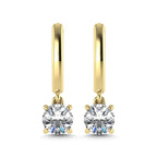 Gold hoop earrings with round gemstones on a white background