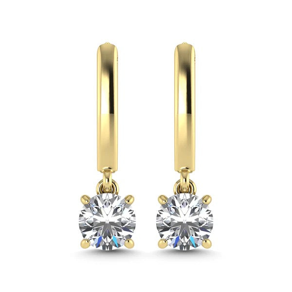 Gold hoop earrings with round gemstones on a white background